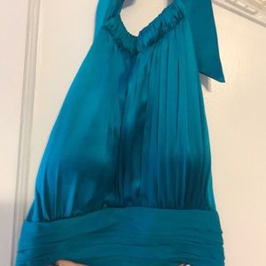 Vibrant turquoise cache cocktail dress